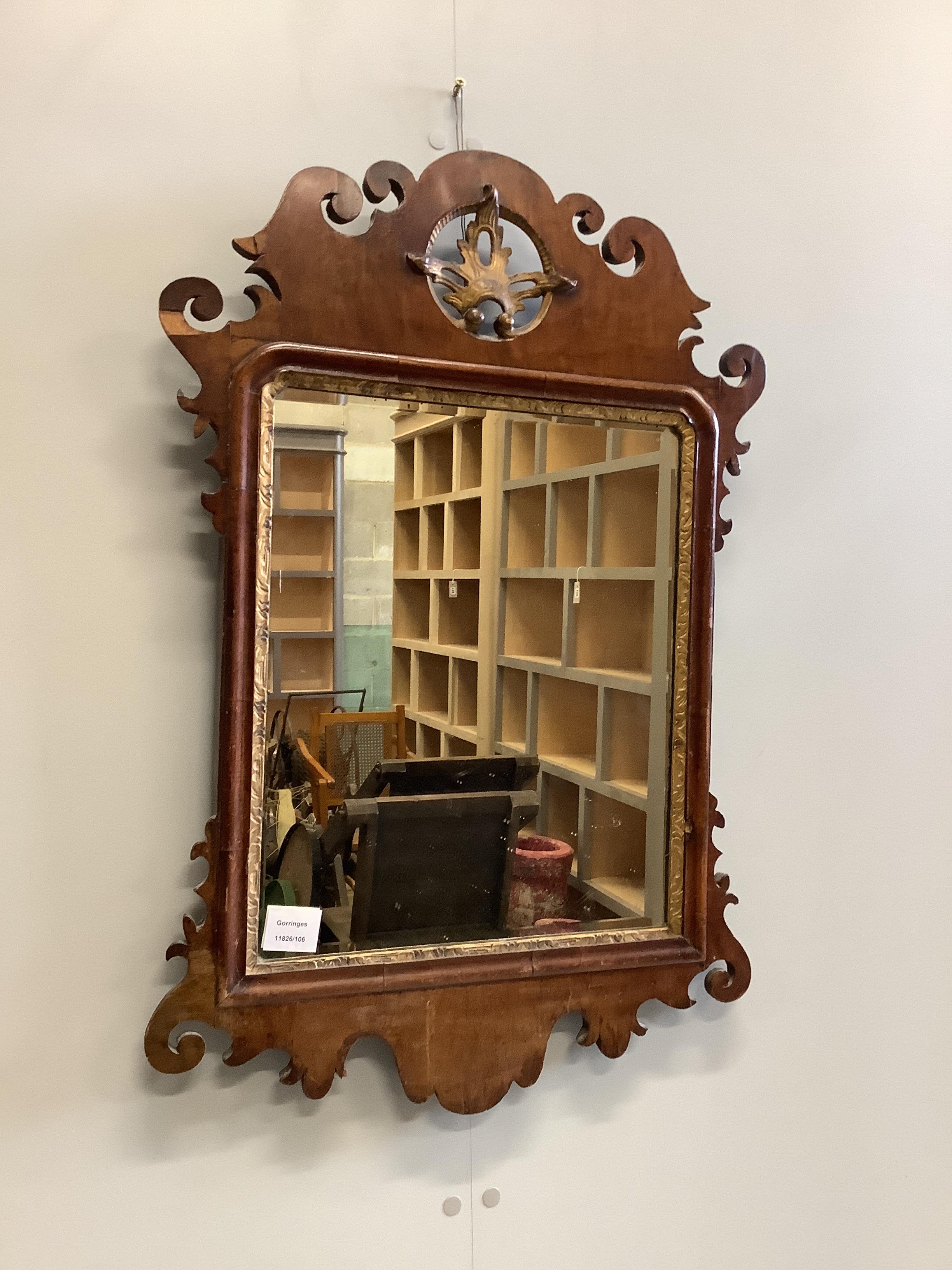 An 18th century style fret cut mahogany wall mirror, width 51cm, height 76cm